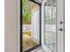 View of patio with a fenced-in yard and an open door to the outside at 522 Auburn Square Dr, Durham, NC 27713