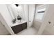 Modern bathroom featuring a sleek vanity, white countertops, and minimalist design at 524 Folk Song Way, Wendell, NC 27591