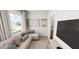 Comfortable living room with ample natural light, a plush sofa, and modern decor at 524 Folk Song Way, Wendell, NC 27591