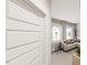 Bright living room with large windows, a neutral color palette, and stylish furnishings at 524 Folk Song Way, Wendell, NC 27591
