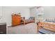 bedroom with a dresser, twin beds, and natural light from the window at 528 Holden Forest Dr, Youngsville, NC 27596