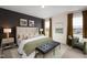 A serene bedroom with a comfortable bed, stylish decor, and ample natural light creating a relaxing retreat at 536 Folk Song Way, Wendell, NC 27591