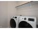 A modern laundry room featuring high-efficiency washer and dryer units with ample space for laundry tasks at 536 Folk Song Way, Wendell, NC 27591