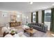 Open-concept living and dining areas with hardwood floors and abundant natural light at 536 Folk Song Way, Wendell, NC 27591