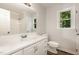 Bathroom features tile flooring, tub/shower, and a vanity with a white countertop at 5604 Groomsbridge Ct, Raleigh, NC 27612