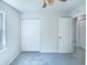 Well-lit bedroom featuring plush carpet, closet space, and neutral walls, ready for personal touches at 5828 Brambleton Ave, Raleigh, NC 27610
