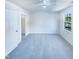 Spacious bedroom with neutral walls, a window, and a closet at 5828 Brambleton Ave, Raleigh, NC 27610