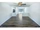 Open concept living space with hardwood floors, recessed lighting, and bright natural light at 5828 Brambleton Ave, Raleigh, NC 27610