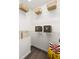 Walk-in closet shows wire shelving with storage boxes, a pillow, and a yellow throw at 6 Landover Ct, Durham, NC 27713