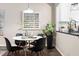 Cozy dining area with modern decor next to an open kitchen at 6 Landover Ct, Durham, NC 27713