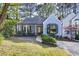 Charming blue home with a cozy front porch and lush landscaping at 6 Landover Ct, Durham, NC 27713