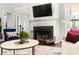 Living room with fireplace and built-in shelving at 6 Landover Ct, Durham, NC 27713
