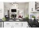 Open concept view from the kitchen into the living room with a fireplace at 6 Landover Ct, Durham, NC 27713