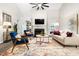 Bright living room features fireplace and chic furnishings at 6 Landover Ct, Durham, NC 27713