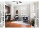Office/flex space featuring nice trim, hardwood floors, a ceiling fan, and lots of natural light at 609 Conover Rd, Durham, NC 27703