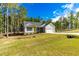 Attractive single-Gathering home with a two-car garage, set on a spacious lot with mature trees at 61 Okra Ct, Selma, NC 27576