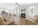 Spacious living room with a fireplace and an open layout at 61 Okra Ct, Selma, NC 27576