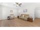 Comfortable living room with wood flooring and a neutral color scheme at 61 Okra Ct, Selma, NC 27576