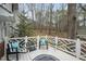 Enjoy serene views from this relaxing back deck with chairs and tables at 6212 Trevor Ct, Raleigh, NC 27613