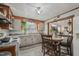 Charming eat-in kitchen with modern appliances and stylish granite countertops at 729 S Carolina Ave, Henderson, NC 27536