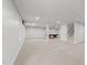 Spacious basement with new carpet, recessed lighting, bright windows, and pool table area at 733 Holding Ridge Ct, Wake Forest, NC 27587