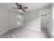 Bedroom with neutral walls, carpet flooring, ceiling fan, and natural light at 733 Holding Ridge Ct, Wake Forest, NC 27587