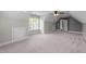 Spacious bonus room with neutral walls, carpet flooring, and window at 733 Holding Ridge Ct, Wake Forest, NC 27587
