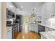 A kitchen featuring modern appliances, countertops, cabinets, and flooring at 733 Holding Ridge Ct, Wake Forest, NC 27587