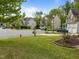 A charming neighborhood street with well-maintained lawns and diverse home styles creating a welcoming atmosphere at 733 Holding Ridge Ct, Wake Forest, NC 27587