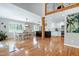 Open floor plan with dining area adjacent to the kitchen, with views to the backyard at 831 Healey Ln, Durham, NC 27705