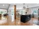 Sun-filled dining area with hardwood floors and a view of the outdoor space at 831 Healey Ln, Durham, NC 27705