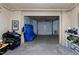 Open garage with ample space for storage and vehicles, providing convenience at 831 Healey Ln, Durham, NC 27705