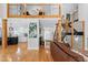 Open-concept living area with staircase and kitchen in the background at 831 Healey Ln, Durham, NC 27705
