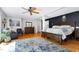 Spacious main bedroom boasts a ceiling fan and ample natural light, creating a relaxing retreat at 831 Healey Ln, Durham, NC 27705