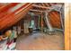 View of the unfinished attic space, ideal for storage or future renovation at 8805 Mourning Dove Rd, Raleigh, NC 27615