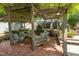 Relaxing brick patio with comfortable seating and shaded pergola at 8805 Mourning Dove Rd, Raleigh, NC 27615