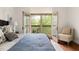 View from bedroom balcony showcases lush greenery and a peaceful outdoor setting at 97302 Dobbs, Chapel Hill, NC 27517