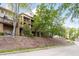 Multi-level condo complex showcasing wood balconies and a hillside setting at 97302 Dobbs, Chapel Hill, NC 27517