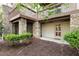 Outdoor patio area with stone pillars and a wooden deck at 97302 Dobbs, Chapel Hill, NC 27517