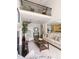 Spacious living room featuring a fireplace, hardwood floors, and a balcony with a view to the main floor below at 97302 Dobbs, Chapel Hill, NC 27517