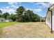 Expansive backyard with lush trees and natural landscape at 1008 Peedin Rd, Selma, NC 27576