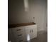 New bathroom boasts a contemporary vanity with white cabinets and sleek, dark hardware at 1008 Peedin Rd, Selma, NC 27576