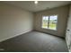 Bedroom has neutral paint color and soft carpeting at 1008 Peedin Rd, Selma, NC 27576