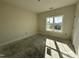 Cozy room with natural light streaming through a window, a blank canvas ready for your personal touch at 1008 Peedin Rd, Selma, NC 27576