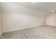 Finished bonus room with neutral walls and carpet has ample space for activities at 1008 Peedin Rd, Selma, NC 27576