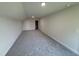 Spacious bonus room featuring plush carpeting and ample natural light perfect for entertaining or relaxing at 1008 Peedin Rd, Selma, NC 27576