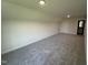 Spacious bonus room featuring neutral carpeting, recessed lighting, and ample natural light at 1008 Peedin Rd, Selma, NC 27576