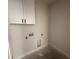 The laundry room has connections for both washer and dryer at 1008 Peedin Rd, Selma, NC 27576