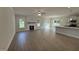Spacious living room with fireplace, wood flooring, and open floor plan at 1008 Peedin Rd, Selma, NC 27576