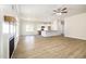 Bright open-concept space with fireplace and views into the light kitchen at 1008 Peedin Rd, Selma, NC 27576